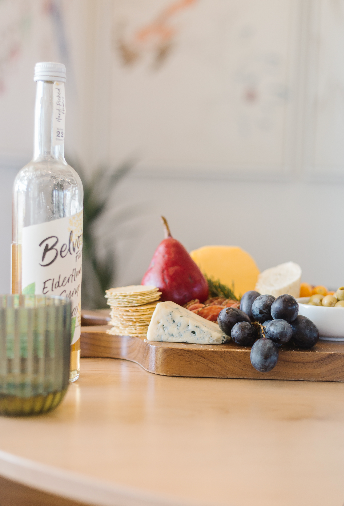 charcuterie board with drink